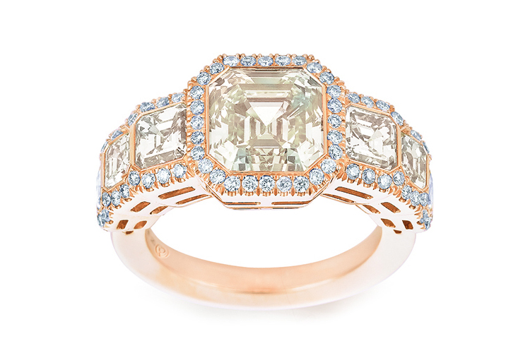 Hints of yellow asscher ring with off-white diamonds