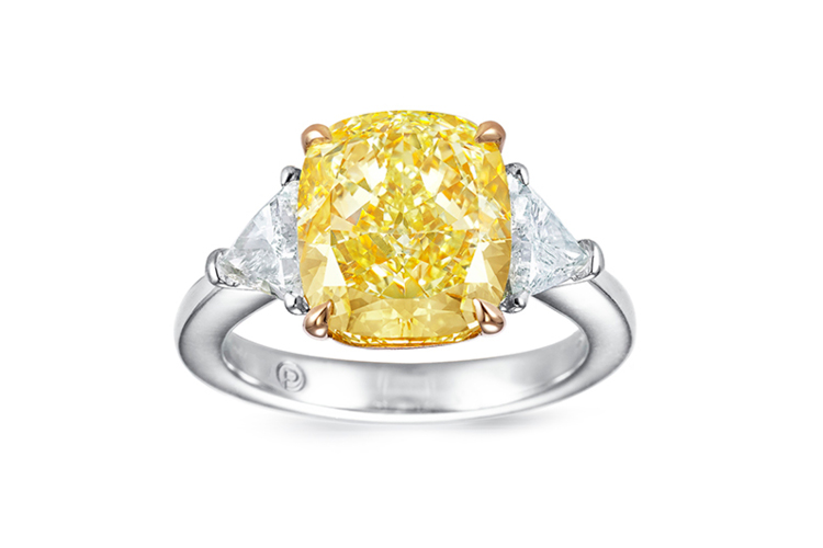 Cushion cut yellow diamond and half-moon white diamond ring