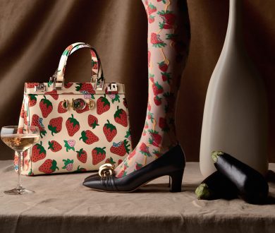 Zumi strawberry print top handled bag, mid-heel pumps with half-moon GG and strawberry print tights