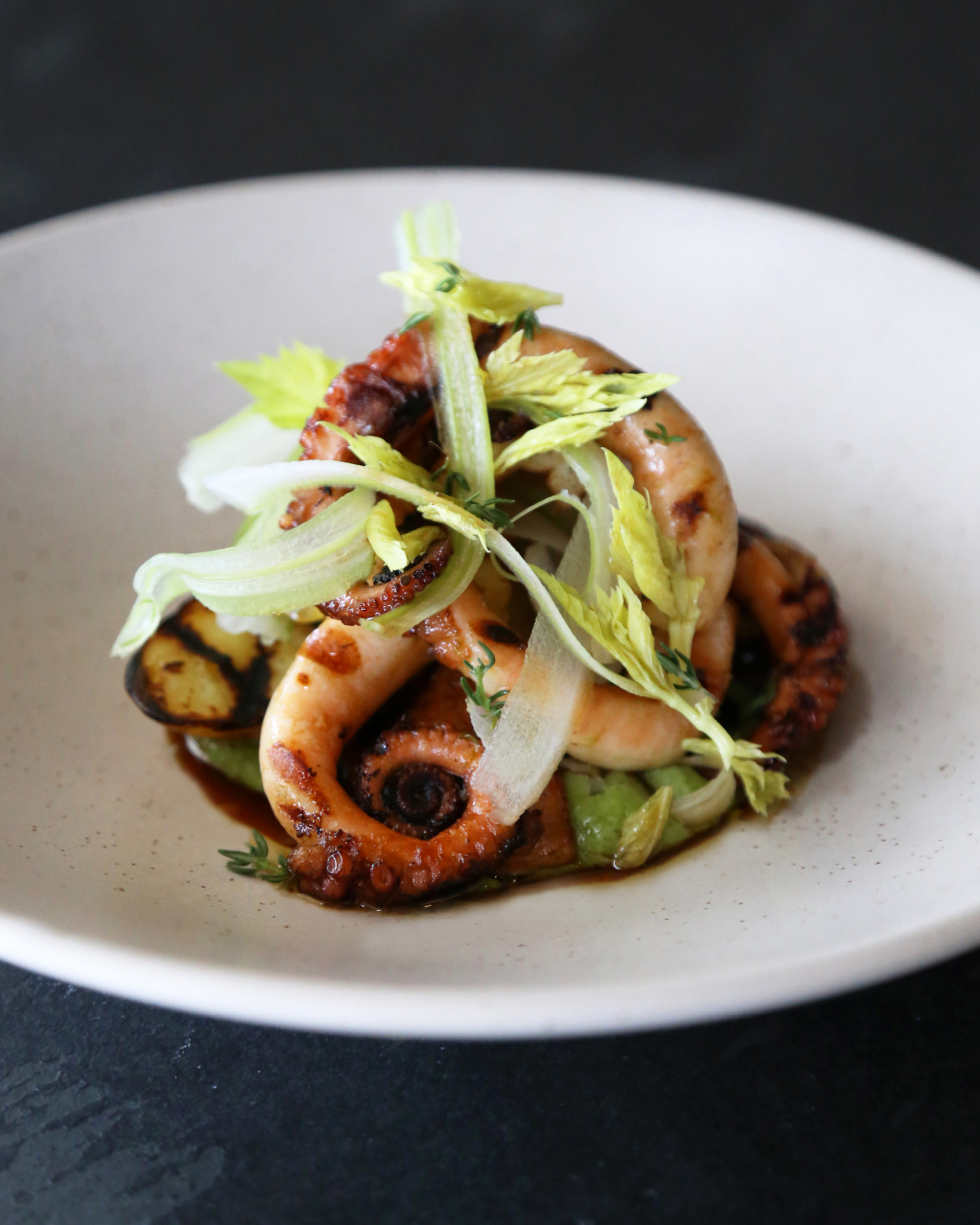 Barbecued octopus, wild thyme, baby potato and lime