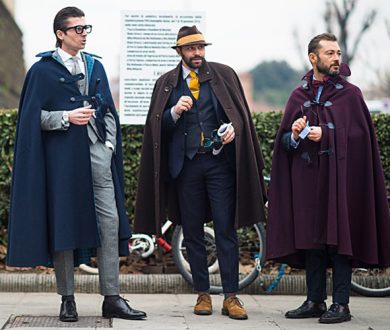 Why more men should ditch the sleeves and drape their coats over their shoulders