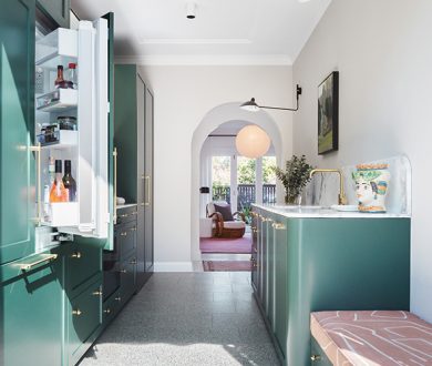 A unique kitchen sits at the heart of this newly-renovated apartment