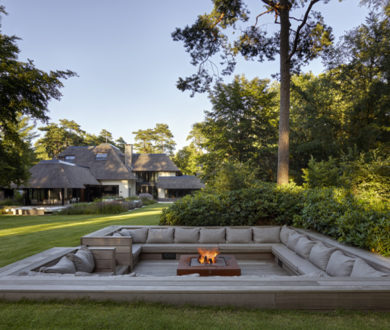 Nestled in a private wooded enclave, this spectacular home has far more to it than meets the eye