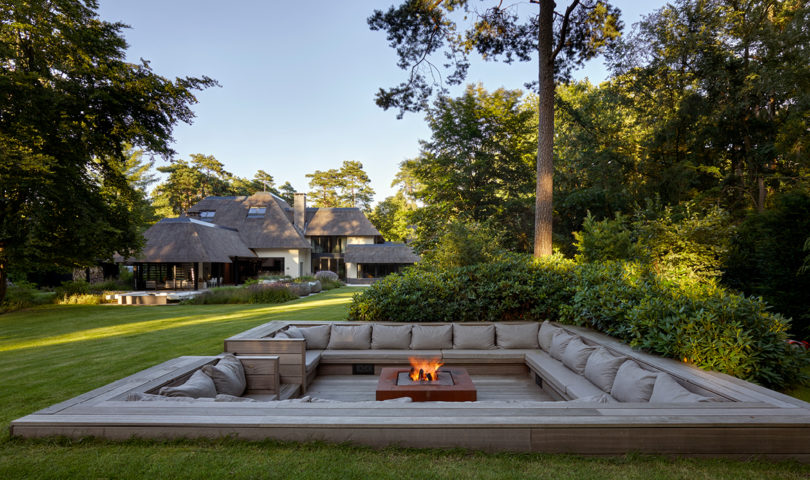 Nestled in a private wooded enclave, this spectacular home has far more to it than meets the eye