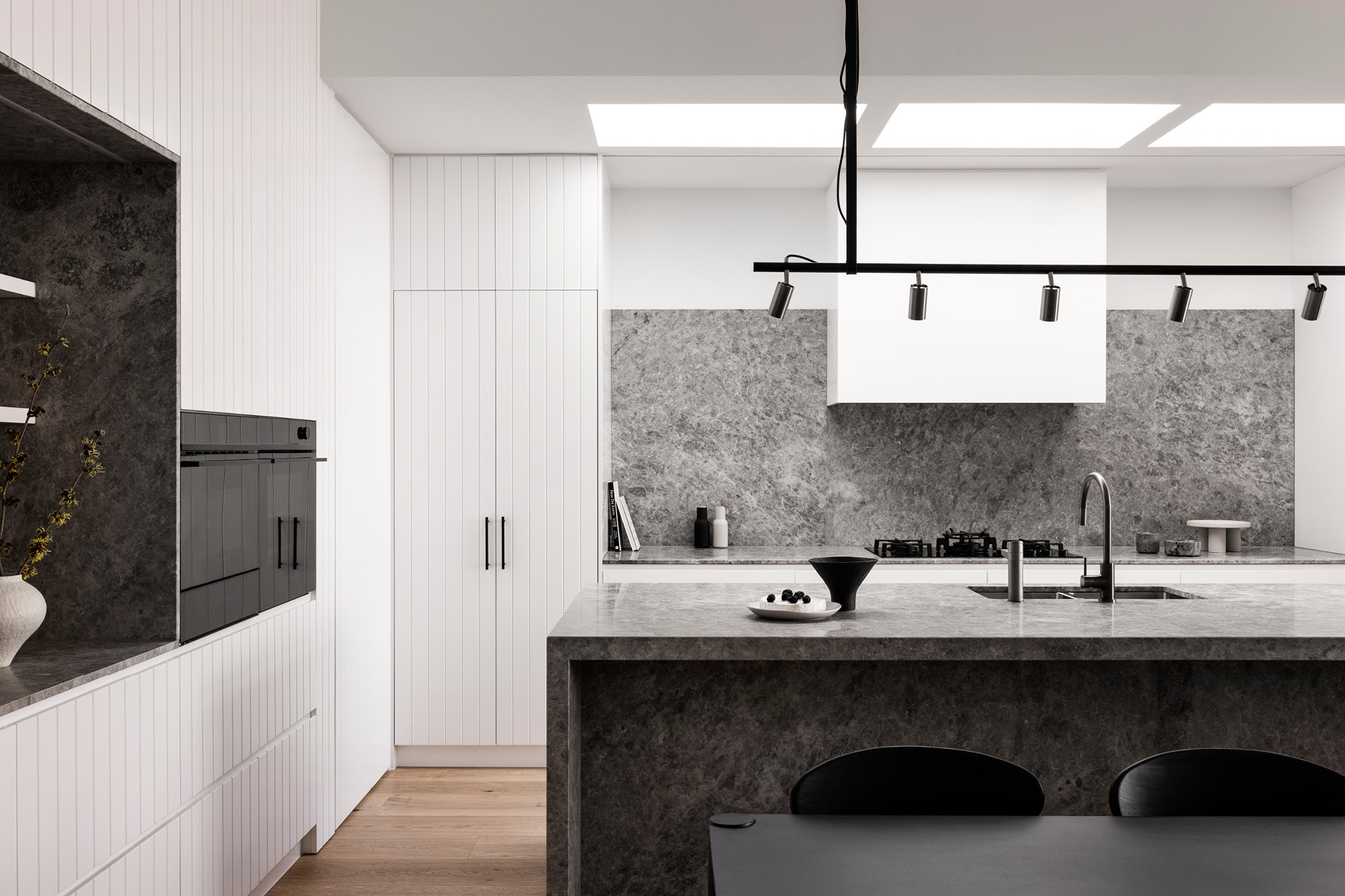 Using Fisher & Paykel appliances, this kitchen is a minimalist haven
