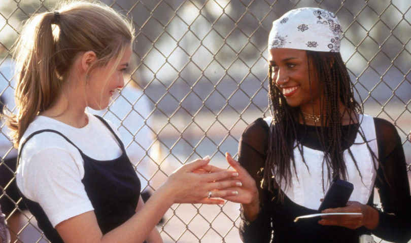 Elevate your everyday essentials with this 90s-inspired layered T-shirt trend